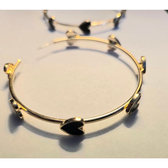 Fashion Gold Tone 2.5 Inch Hoop Earring with Black Hearts - Picture 2 of 5